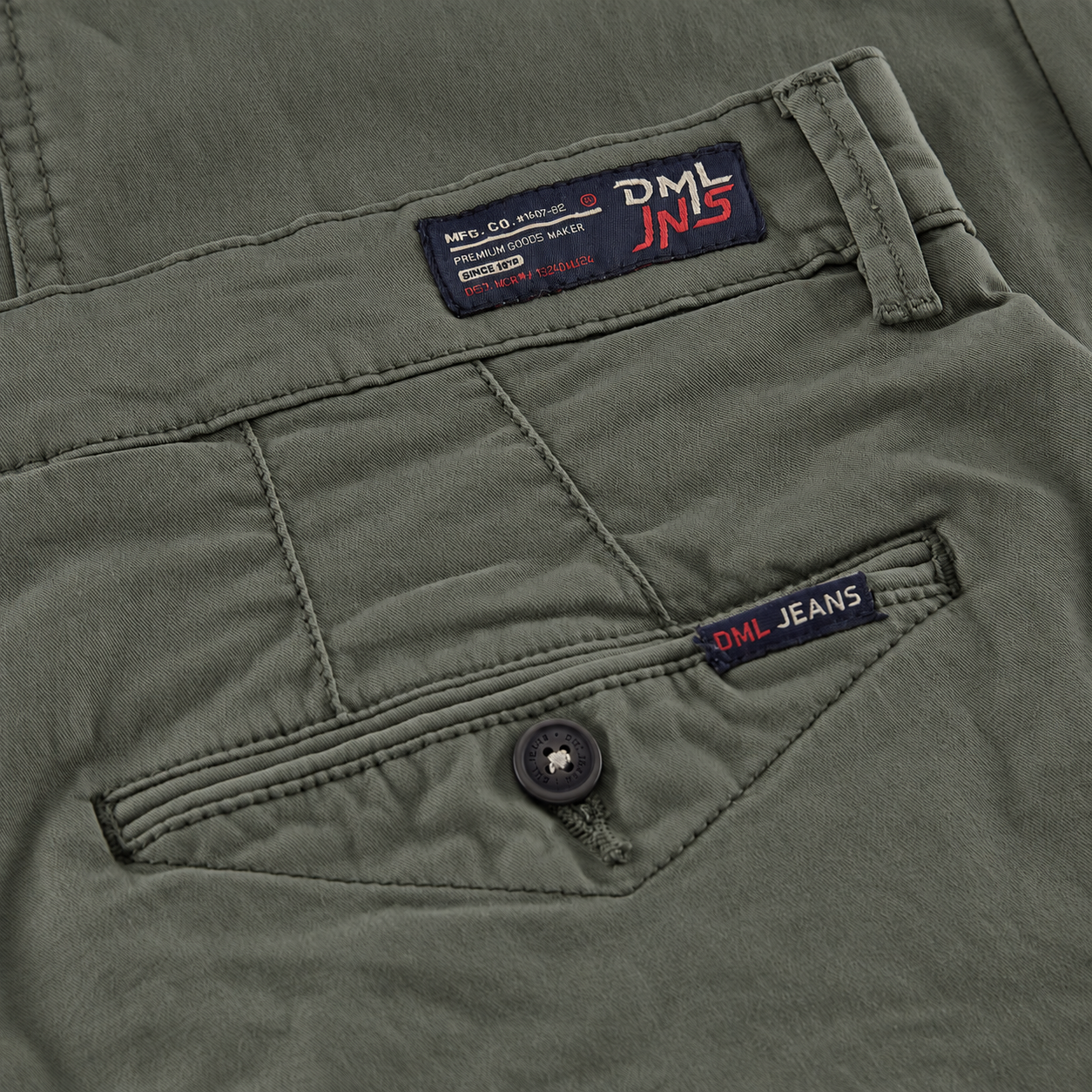 close up image of back pocket on a mens slim fit chino trouser in dark olive from the DML Jeans brand