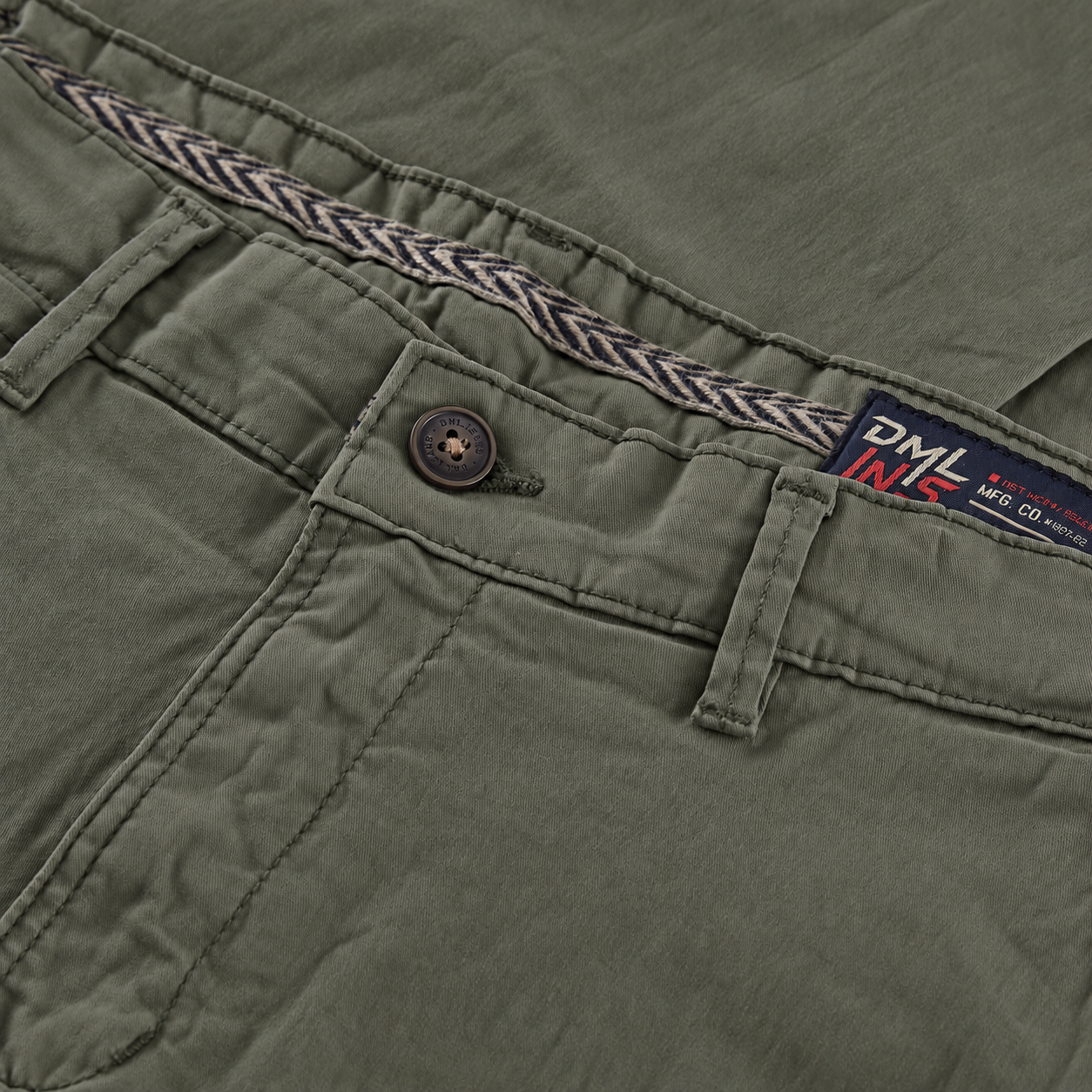 Close up front image of a mens slim fit chino trouser in dark olive from the DML Jeans brand