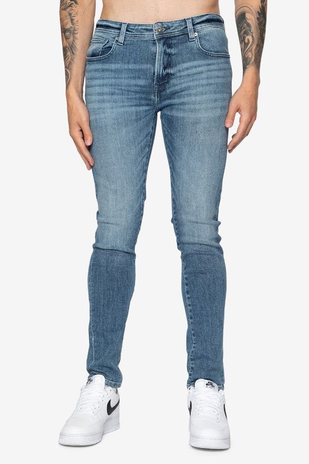 Striker Skinny Flxtreme Jeans In Mid Wash - DML Jeans 